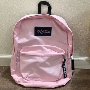 Jansport Light Pink Backpack with Front Pocket